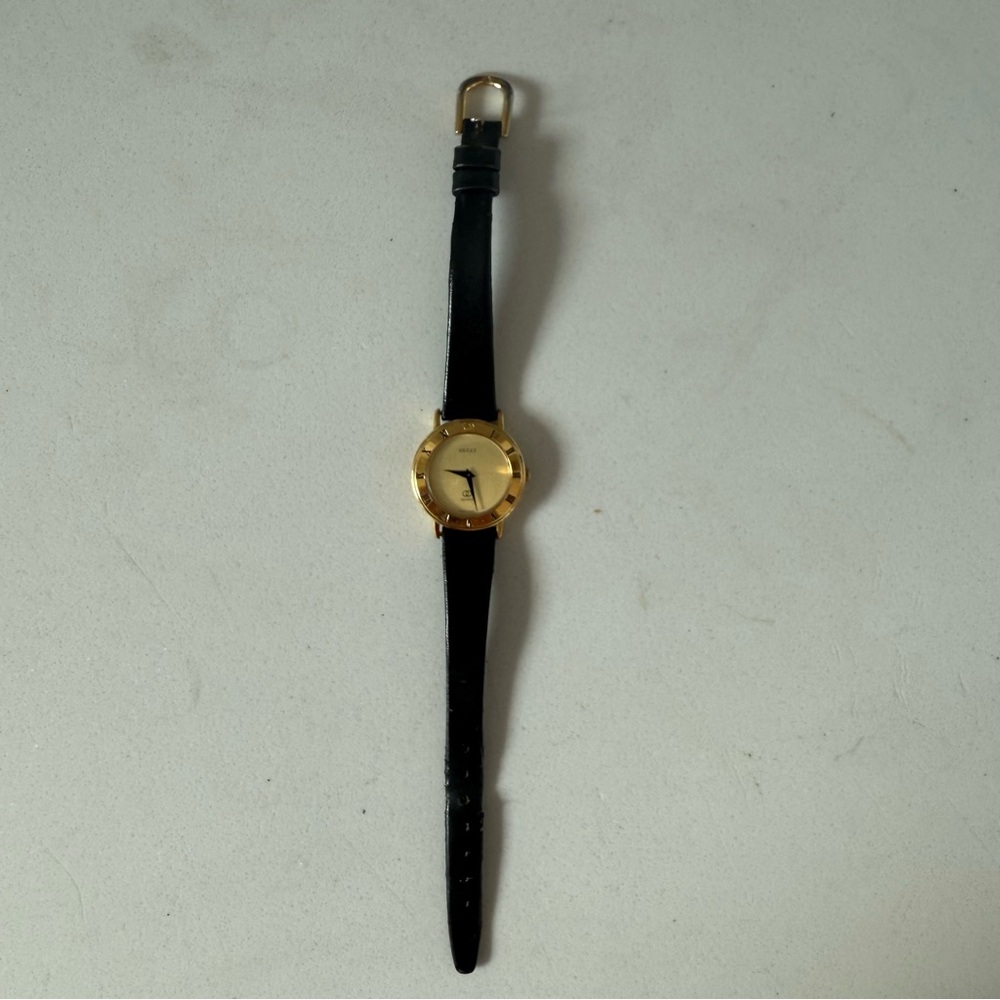Gucci Black and Hold Women’s Watch